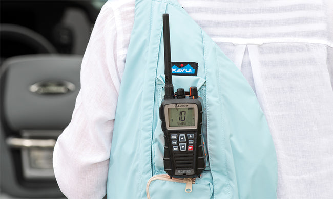 Cobra Blue Bound 350 clipped to the back of a light blue backpack